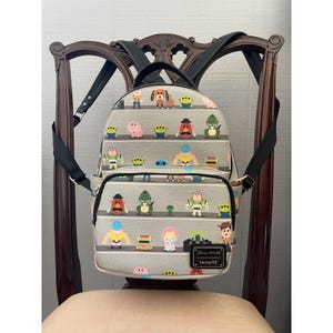 Loungefly Disney Pixar Toy Story Woody & Buzz Clouds Mini Backpack Andy Room image 1
