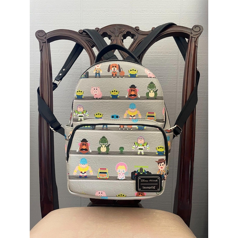 Loungefly Disney Pixar Toy Story Woody & Buzz Clouds Mini Backpack Andy Room image 1