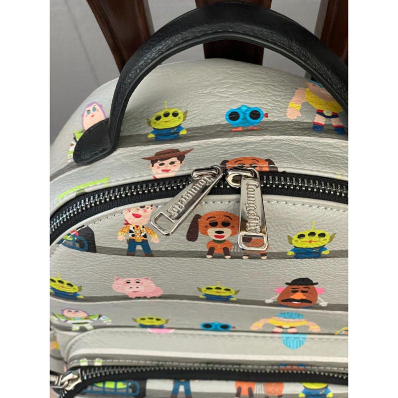 Loungefly Disney Pixar Toy Story Woody & Buzz Clouds Mini Backpack Andy Room image 6