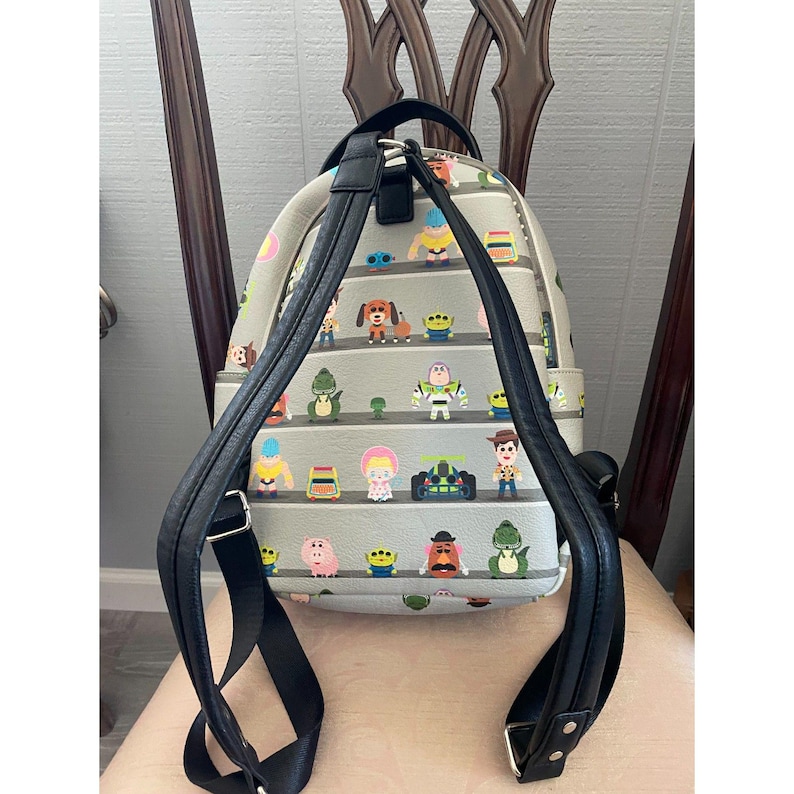Loungefly Disney Pixar Toy Story Woody & Buzz Clouds Mini Backpack Andy Room image 2