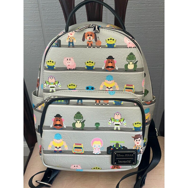 Loungefly Disney Pixar Toy Story Woody & Buzz Clouds Mini Backpack Andy Room image 7
