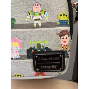 Loungefly Disney Pixar Toy Story Woody & Buzz Clouds Mini Backpack Andy Room image 3