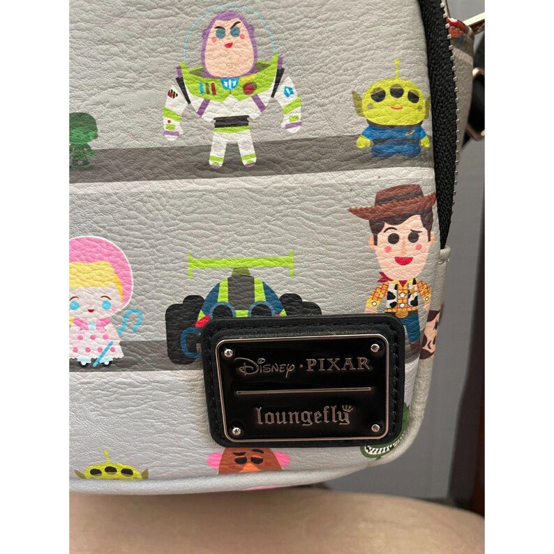 Loungefly Disney Pixar Toy Story Woody & Buzz Clouds Mini Backpack Andy Room image 3