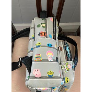 Loungefly Disney Pixar Toy Story Woody & Buzz Clouds Mini Backpack Andy Room image 9