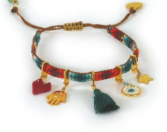 Fairtrade-pärlarmband handgjort av kvinnor i Columbia Gåvor för ett syfte