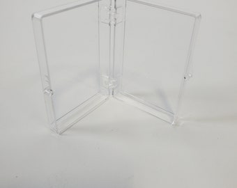 Clear 2" x 3" plastic box with snap clasp.  25 per case.