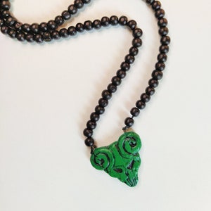 The Pick of Destiny Pendant With black beads