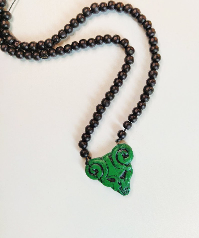 The Pick of Destiny Pendant With black beads