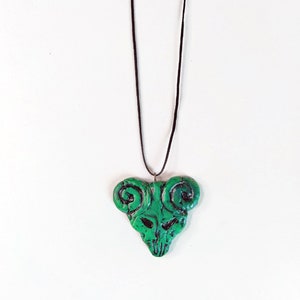 The Pick of Destiny Pendant With waxed treat