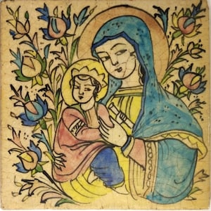 May include: A square, vintage ceramic tile featuring a religious illustration. The image depicts a woman in a blue veil holding a child, surrounded by floral elements in shades of blue, pink, and yellow. The tile has a distressed, aged appearance.