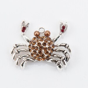 Pendentif crabe, argent avec strass rouges et marron, 40 x 35 mm, 1 pièce
