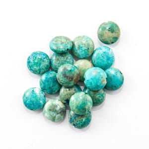 Stabilized Turquoise Beads, 10mm Puffed Flat Round, 7 inch strand / 15 count