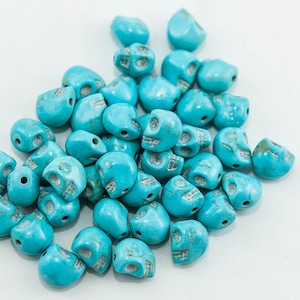 Light Blue Skull Beads: 9x8mm, Resin (Approx. 35 count)