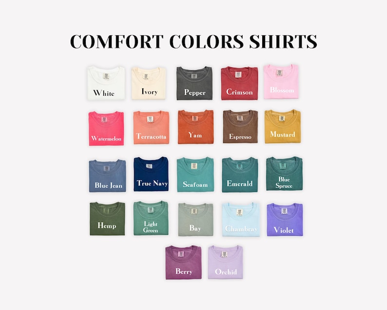 Puede incluir: Una colecci&oacute;n de camisetas Comfort Colors en varios tonos, incluyendo blanco, marfil y carmes&iacute;. La imagen muestra una gama de colores, como azul vaquero, azul marino y violeta. El texto "COMFORT COLORS SHIRTS" est&aacute; en la parte superior.