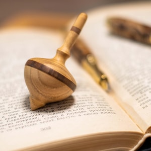 Unique wooden spinning top for adult and kids
