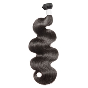 May include: A bundle of black human hair extensions in a body wave pattern. The hair is long and wavy, and it is tied together at the top with a white elastic band.
