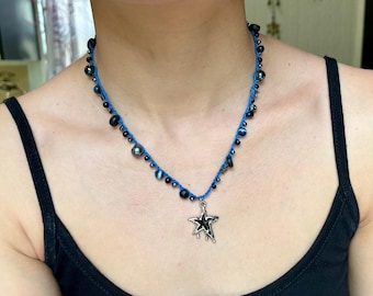 Handmade blue, black and white crochet beaded necklace with dripping star charm
