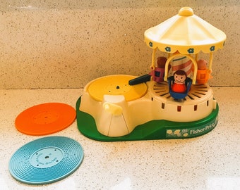 Vintage Fisher Price Change-a-tune Carousel With Little People