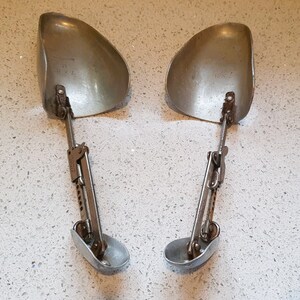 A pair of Mens vintage Dolcian English silver metal shoe shoe tree, shoe lasts, shoe protectors - Adjustable