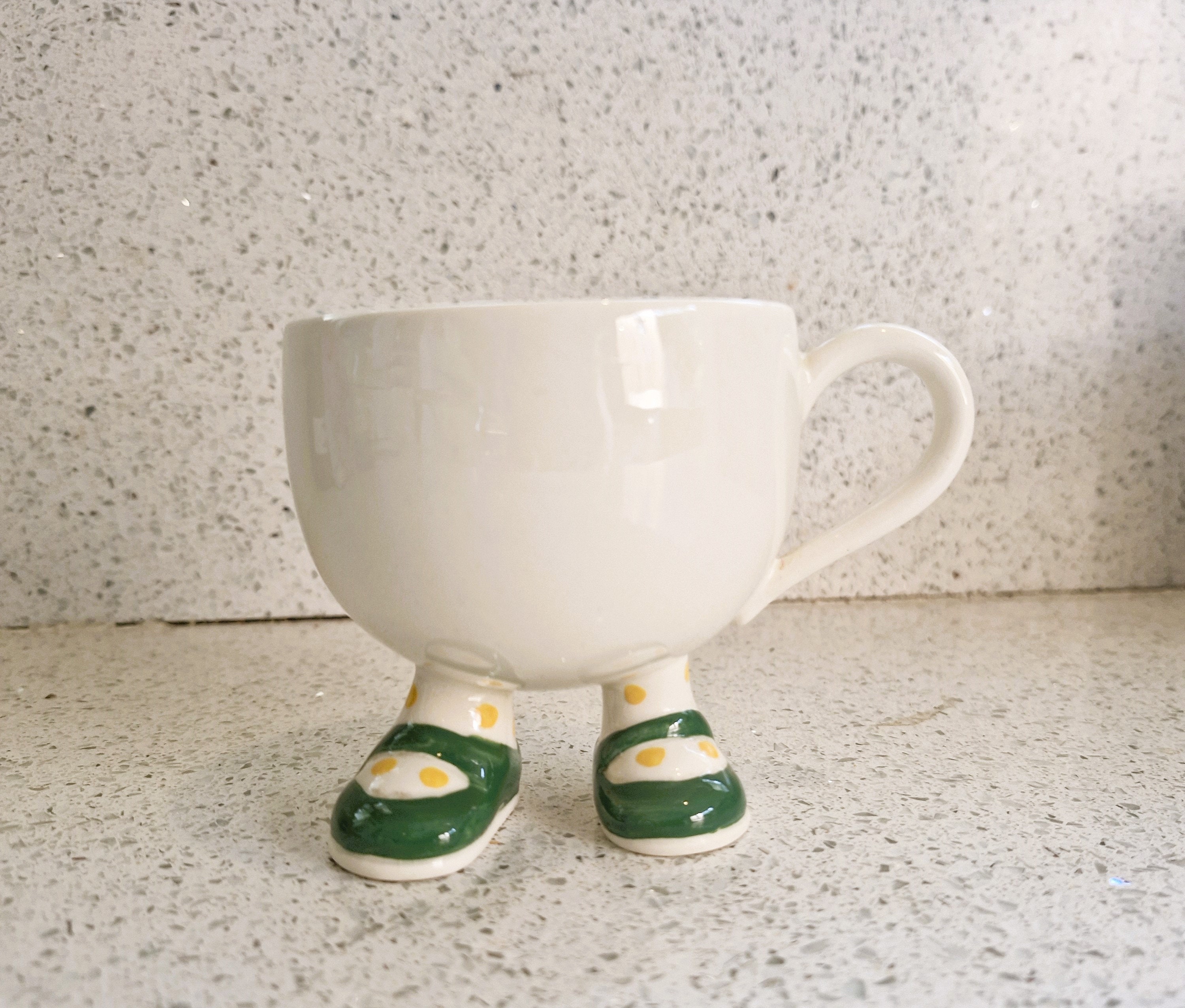 Cups with feet discount