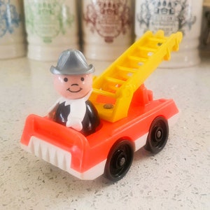 Vintage Fisher Price Fire Engine with Fireman Toy