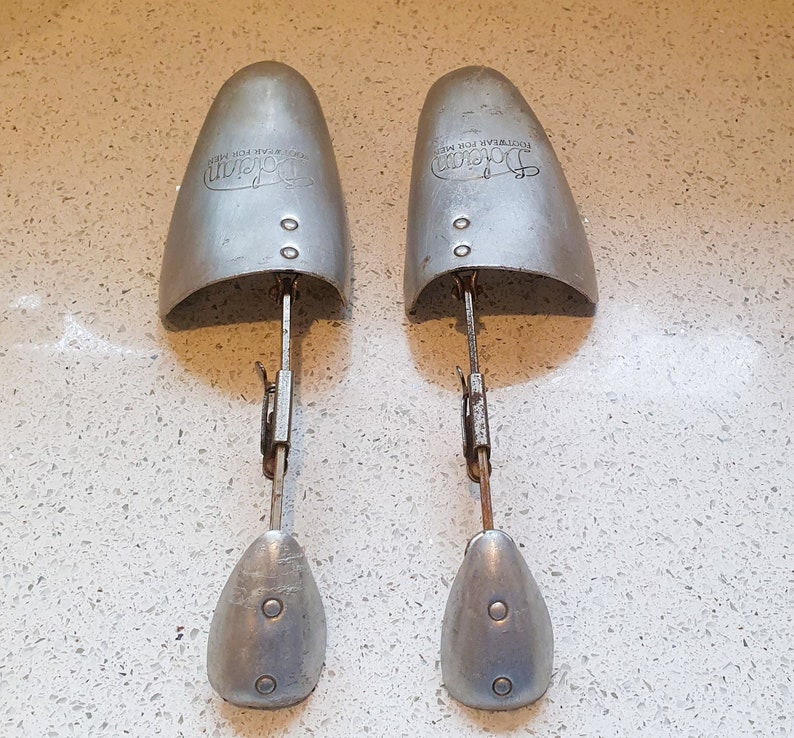 A pair of Mens vintage Dolcian English silver metal shoe shoe tree, shoe lasts, shoe protectors - Adjustable