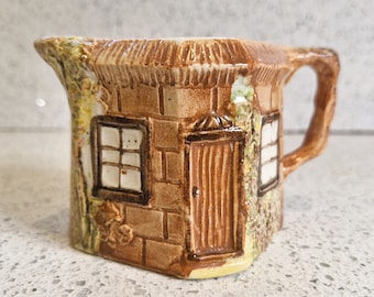 ビンテージ Kleen Kitchen Ware の赤と白の 1pt ミルク ジャグ 