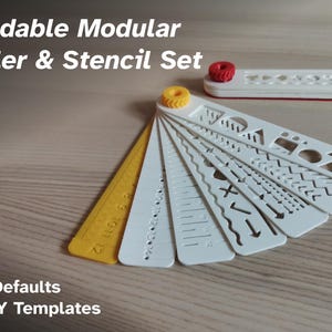 May include: A foldable modular ruler and stencil set featuring white and yellow plastic arms connected by a yellow pivot. The set includes various geometric shapes, wavy lines, and measurement markings. Text reads: Foldable Modular Ruler & Stencil Set - 7 Defaults - DIY Templates.