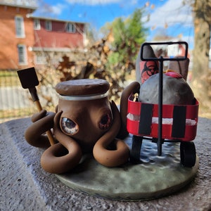 Joe dirt  inspired octopus jar polymer clay 2 oz. stash jar/desk pet.