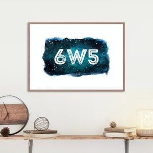 May include: A framed print with a watercolor background of a galaxy in shades of blue and green. The text "6W5" is written in white on the galaxy.