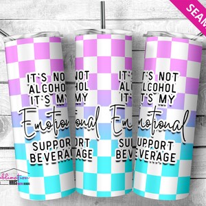 May include: A sublimation design for a tumbler featuring a checkered pattern in pink and blue with the text "It's not alcohol, it's my emotional support beverage".