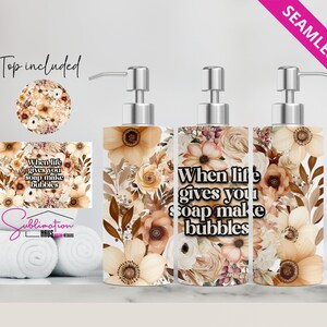 May include: Three brown and white floral patterned soap dispensers with the text "When life gives you soap make bubbles".