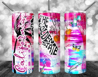 May include: A set of three stainless steel tumblers with lids and straws. Each tumbler features a vibrant design with the words "California" and "The Golden State", along with images of palm trees, flowers, and a butterfly. The color scheme includes pink, blue, and white.