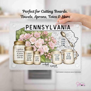 May include: A clear cutting board featuring a Pennsylvania state outline with a floral design and measurement conversions. Includes jars, cups, and a spoon with volume measurements in ounces, cups, and tablespoons.