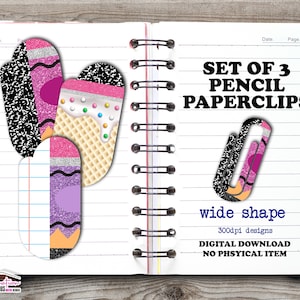 May include: A notebook with a spiral binding displays a set of three pencil-themed paperclips. The paperclips feature designs like a pencil, a waffle cone, and a black and white pattern. Text on the page reads "SET OF 3 PENCIL PAPERCLIPS" and "wide shape."