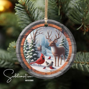 May include: A round wooden Christmas ornament with a winter scene featuring a deer, cardinal birds, and snow-covered trees. The ornament has a rustic wood grain design.