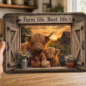 May include: Wooden framed artwork featuring a Highland cow and calf, with chickens and flowers. The artwork has a rustic, farmhouse theme, with the text "Farm life. Best life."