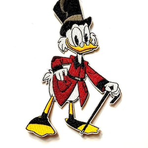 May include: An embroidered patch featuring a cartoon duck character wearing a black top hat, a red coat with black trim, and small round glasses. The character has white feathers, yellow feet, and is holding a black walking cane in one hand.
