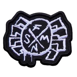 May include: Black and white embroidered patch with the letters "SMN" in a circle and a cross inside the circle. The circle is surrounded by a white outline and a black background.