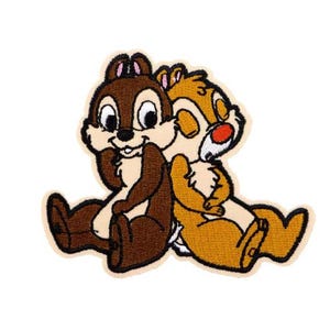 May include: Embroidered patch featuring Chip and Dale from Disney's Chip 'n Dale Rescue Rangers. Chip is brown and Dale is tan. They are hugging each other.
