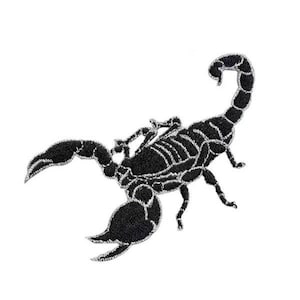 May include: Black embroidered scorpion patch. The scorpion is facing right with its tail curled up. The patch is ideal for adding a touch of edgy style to jackets, bags, or other accessories.