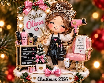 May include: A Christmas ornament featuring a cartoon hairstylist named Olivia with a leopard print headband, holding scissors and a pink hair dryer. The scene includes a salon chair, a cart labeled Cut, Color, Style, Confidence, and text reading Christmas 2026.