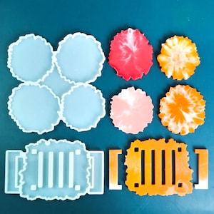 May include: Set of four clear silicone coaster molds with a wavy edge, and two finished resin coasters with a white and orange swirl design. The molds are shown next to the finished coasters.