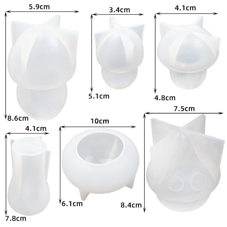 May include: Four clear silicone molds for making candles. The molds are shaped like a mushroom, a star, a flower, and a vase. The molds are 3.4 cm, 4.1 cm, 5.1 cm, 5.9 cm, 6.1 cm, 7.5 cm, 7.8 cm, 8.4 cm, 8.6 cm, and 10 cm in size.
