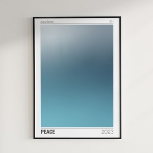 May include: A framed print with a gradient background transitioning from light blue to dark blue. The print has the text "Aura Series" and "001" in the top corners, "PEACE" in the bottom left corner, and "2023" in the bottom right corner.