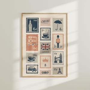 May include: A framed print with a collection of vintage-style postage stamps, each depicting a London landmark or symbol. The stamps feature illustrations of Big Ben, a double-decker bus, a cup of tea, the Union Jack, and the Tower Bridge. The color scheme is blue, peach, and beige.