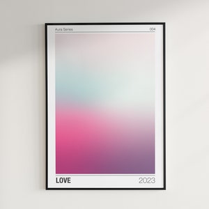 May include: A framed abstract art print with a gradient of pink, purple, and blue colors. The print has the text "Aura Series" and "004" in the top corners, "LOVE" in the bottom left corner, and "2023" in the bottom right corner.