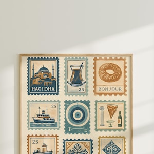 May include: A framed print featuring a collection of postage stamp designs. The stamps showcase various illustrations, including a mosque, a glass of tea, a bagel, a ship, and other decorative elements. The color palette includes shades of blue, brown, and beige.