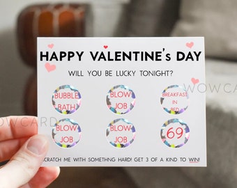 May include: A Valentine's Day scratch-off card with a pink heart and the text "Happy Valentine's Day". The card has six scratch-off circles with different phrases, including "Bubble Bath", "Blow Job", "Breakfast in Bed", and "69". The text "Will you be lucky tonight?" is printed above the circles. The text "Scratch me with something hard! Get 3 of a kind to win!" is printed below the circles.