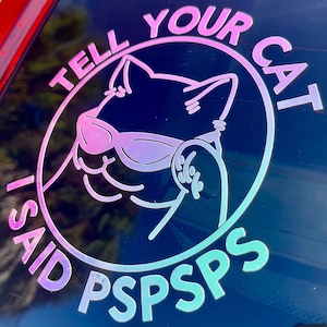 K&ouml;nnte beinhalten: Ein schwarz-wei&szlig;er Aufkleber mit einem rosa-blauen Farbverlauf. Der Aufkleber zeigt eine Comic-Katze mit Sonnenbrille und dem Text "TELL YOUR CAT I SAID PSPSPS".